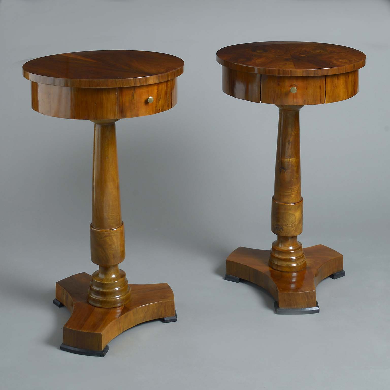 Pair of walnut pedestal side tables