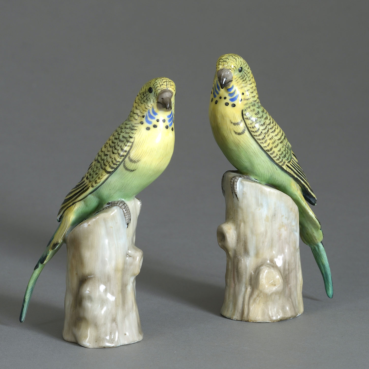 Pair of porcelain parakeet figures